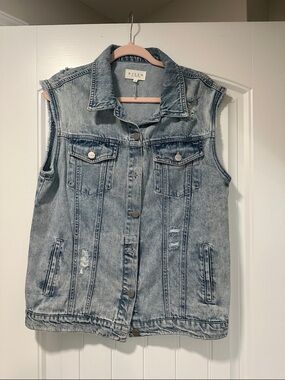 Risen Sleeveless Distressed Denim Vest in Light Blue